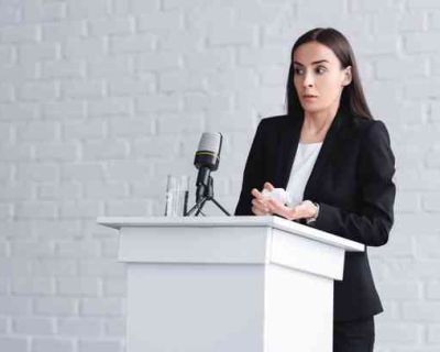 stock-photo-pretty-lecturer-suffering-glossophobia-standing